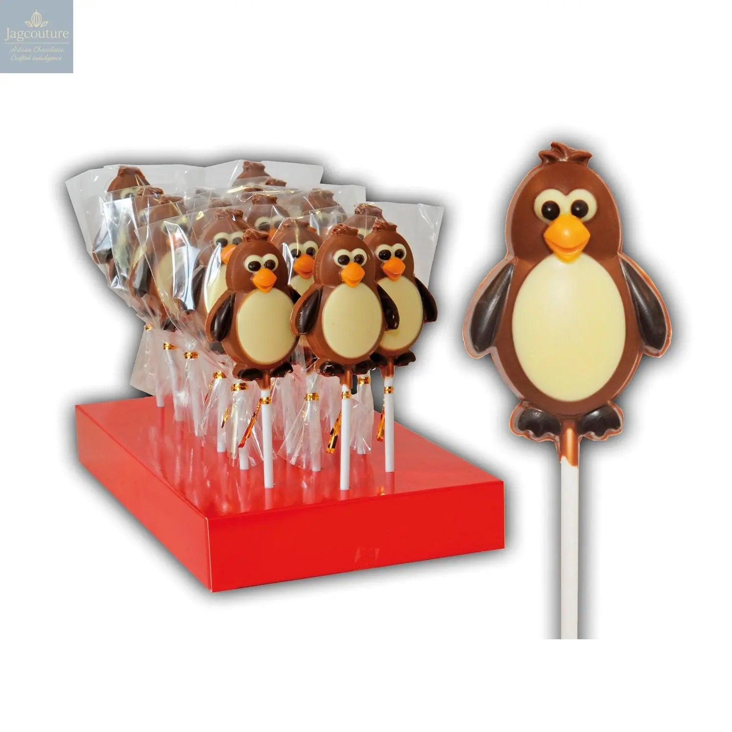 Hand decorated chocolate penguin lollipops in display - Jag Couture Chocolates