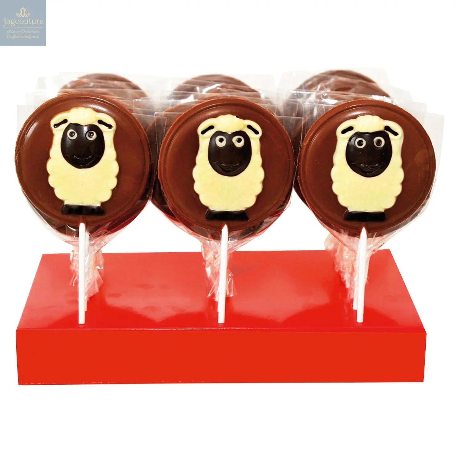 Hand decorated milk chocolate sheep lollipops in display - Jag Couture Chocolates