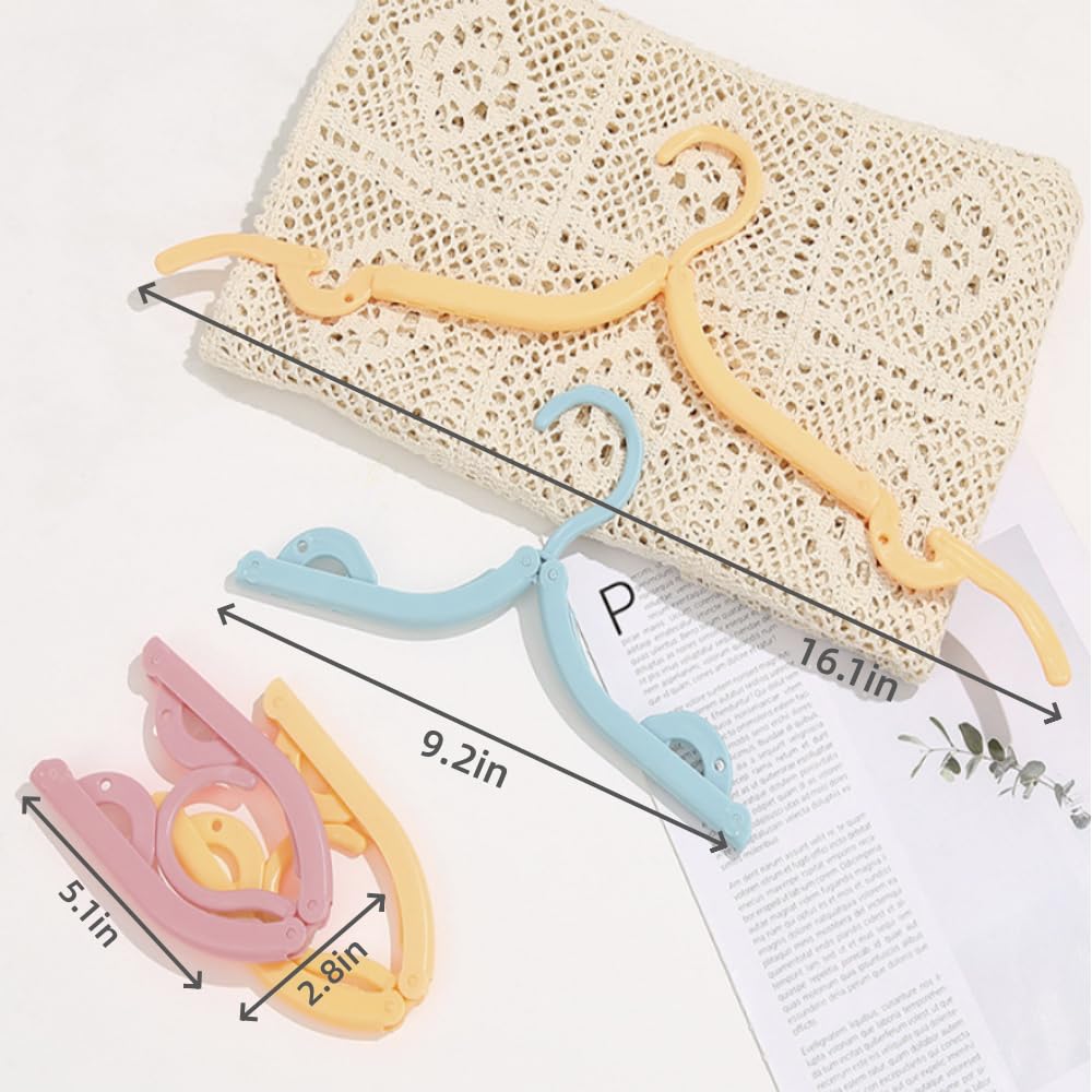 Kiswleon 28PCS Portable Travel Hangers,Four Colors Travel Coat Hangers,Plastic Travel Hanger Foldable,Folding Coat Hanger for Travelling,Foldable