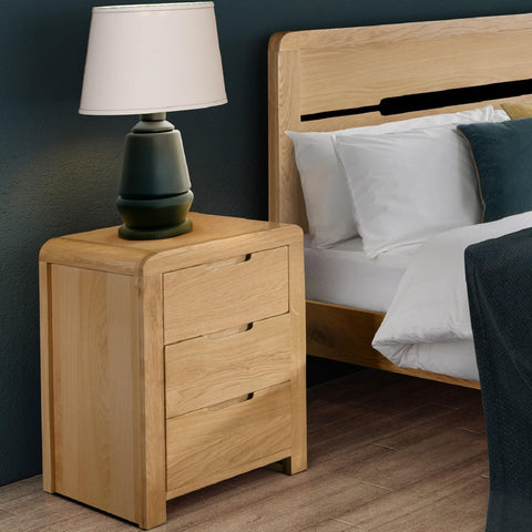 Julian Bowen Curve Bedside Table, 3 Drawer, Solid Oak - H61 x W45 x D38cm