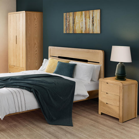 Julian Bowen Curve Bedside Table, 3 Drawer, Solid Oak - H61 x W45 x D38cm