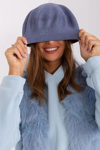 AT Knitted beret with interesting rhinestone application.