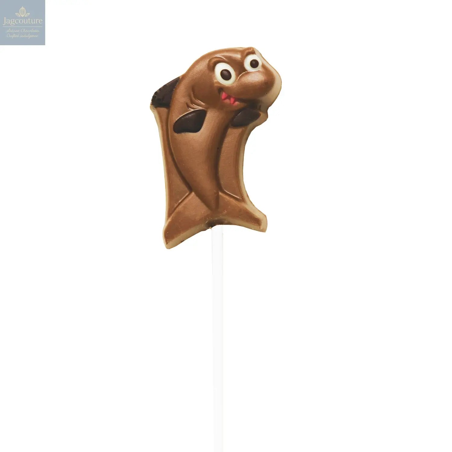 Hand decorated chocolate shark lollipops in display - Jag Couture Chocolates
