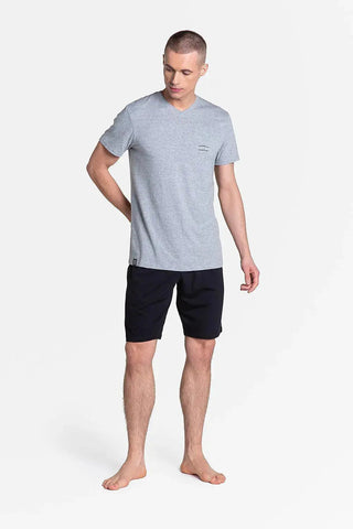 Henderson t-shirt and black trousers