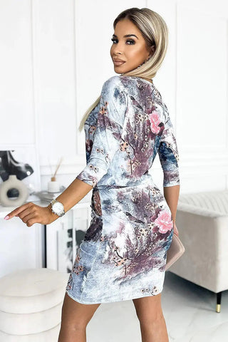 Numoco porty daydress with binding, 3/4 sleeves and pockets, flowers on a stone background