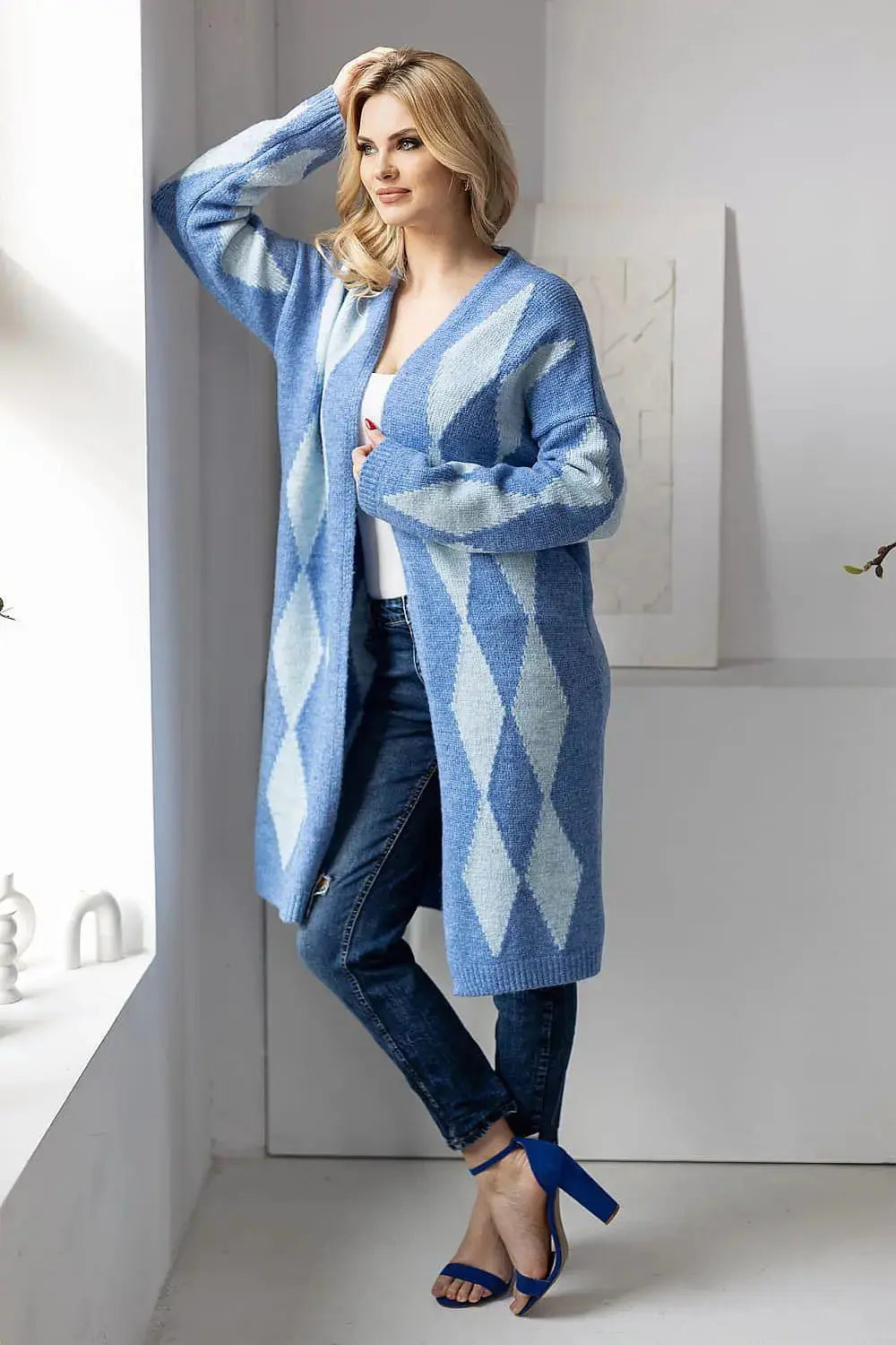 PeeKaBoo loose fit long sleeves sweater