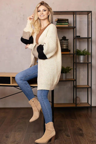 PeeKaBoo looser cut, unbuttoned cardigan