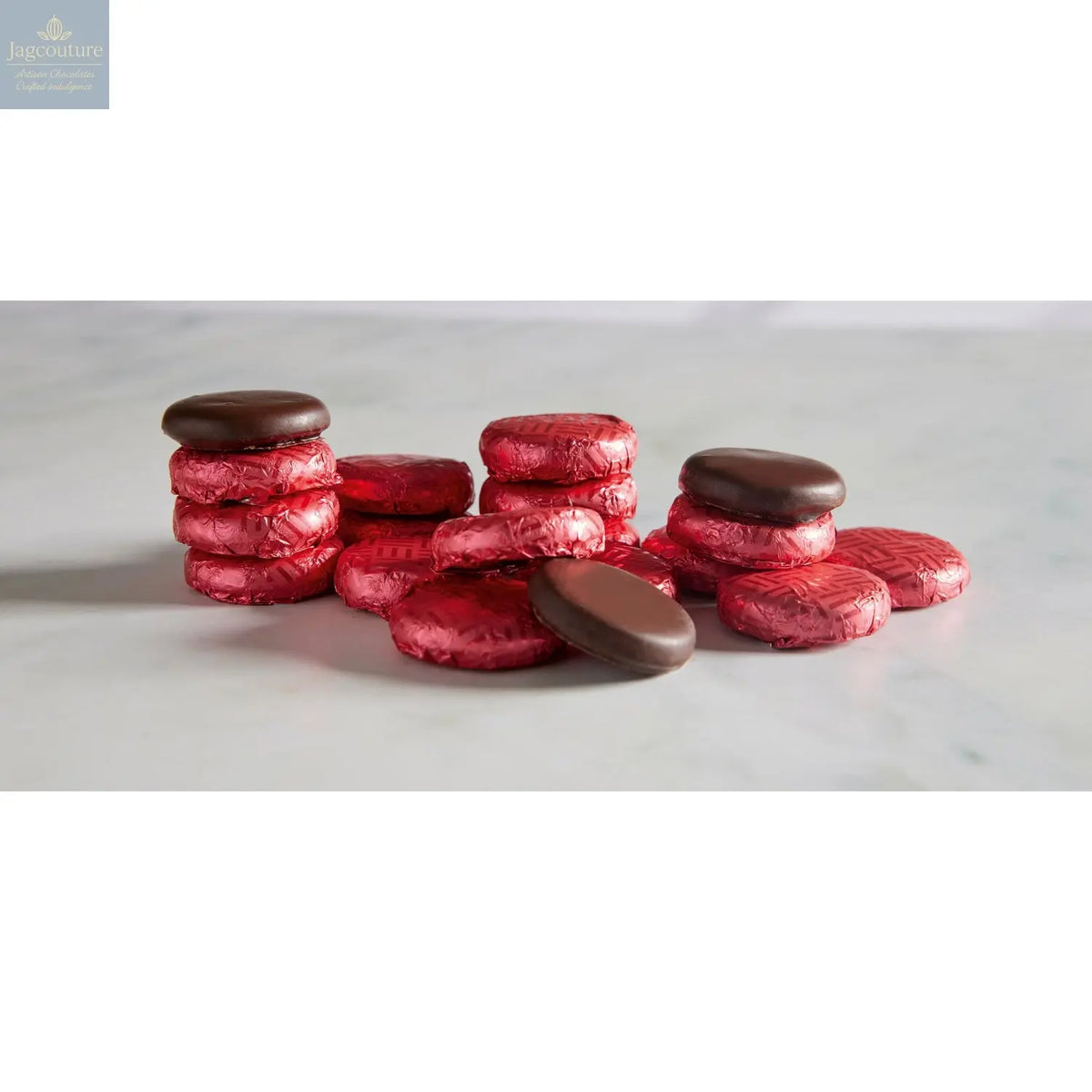 Raspberry crème - dark chocolate covered fondant in magenta coloured foil 120pcs - Jag Couture Chocolates