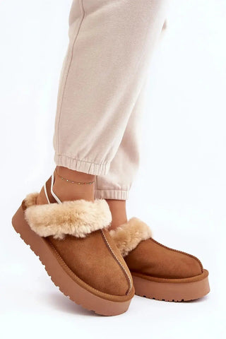 Step in style Fashionable women's slippers made of natural suede