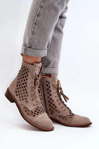 Step in style Unique openwork women's boots.