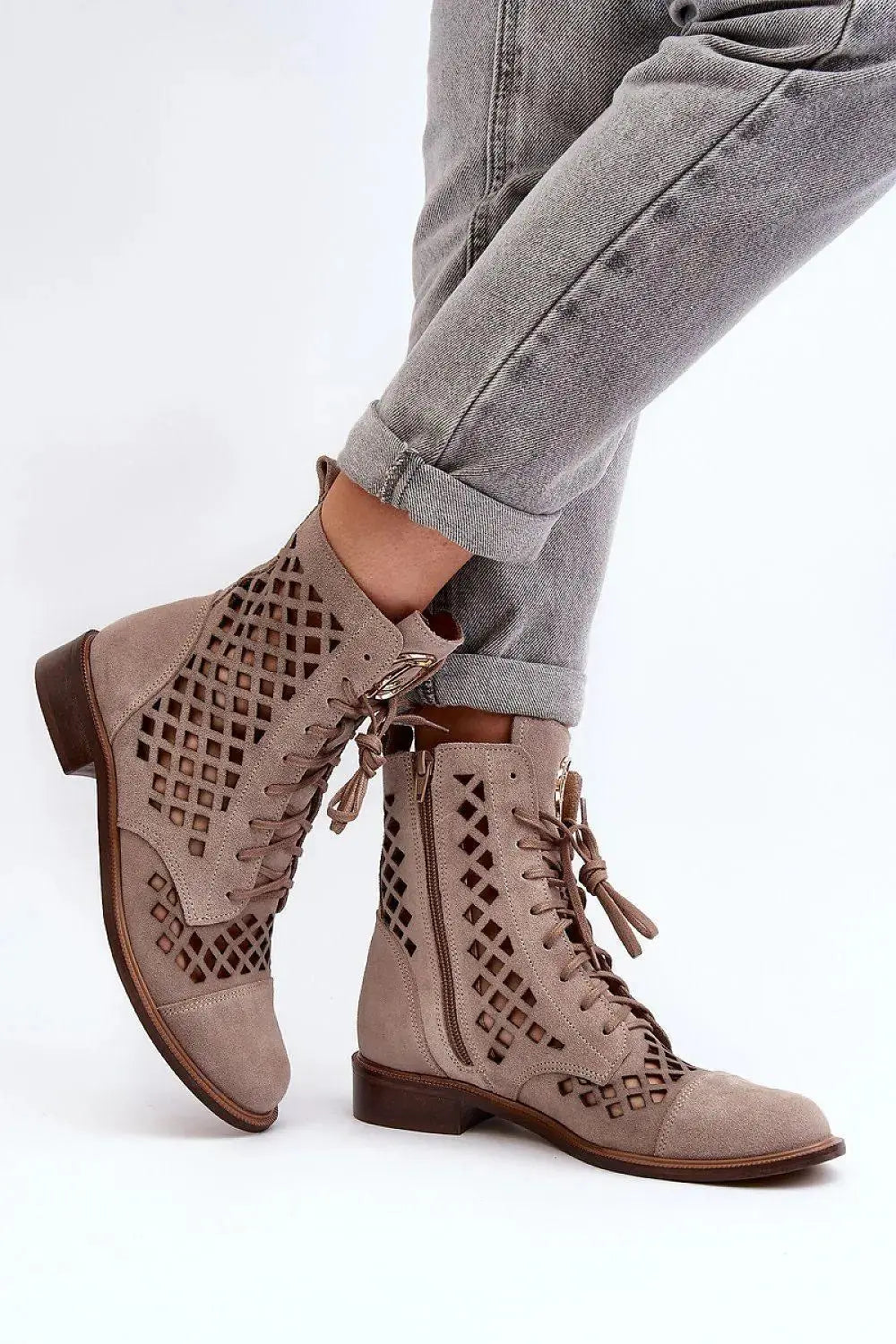 Step in style Unique openwork women's boots.