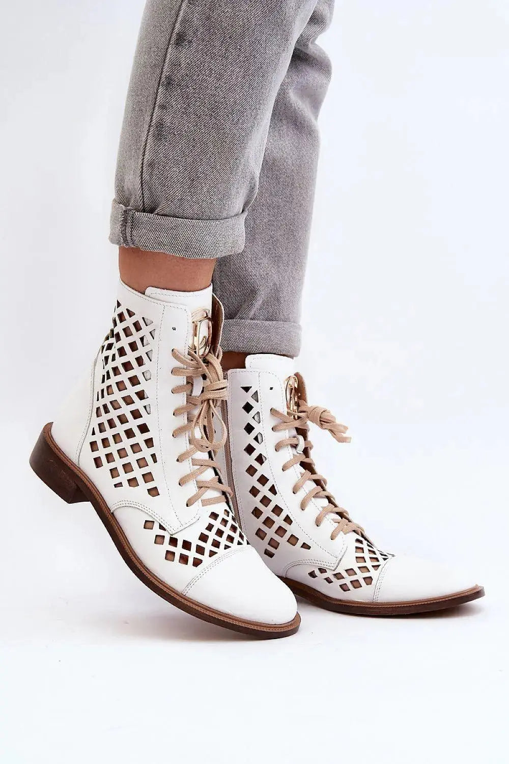Step in style Unique openwork women's boots.