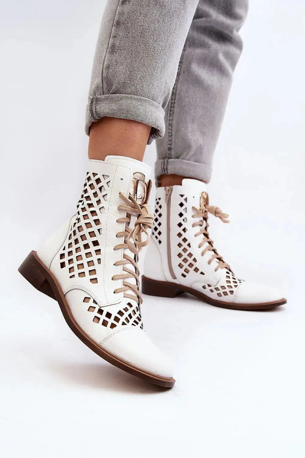 Step in style Unique openwork women's boots.