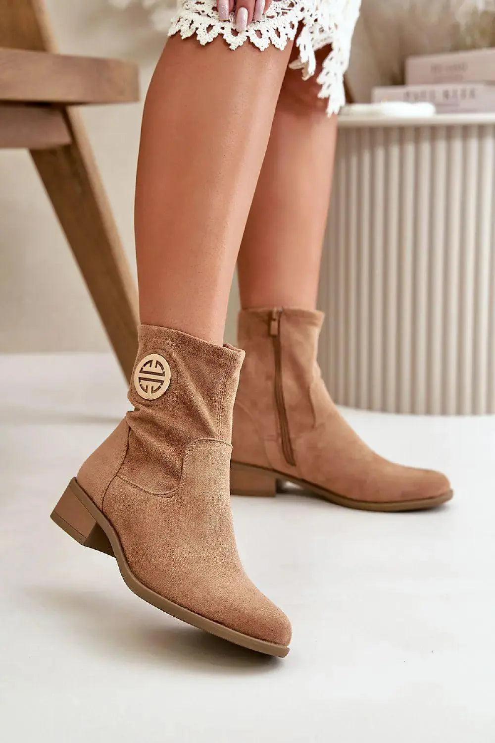 Step in style Women's ankle boots with a low heel from the Jezzi brand