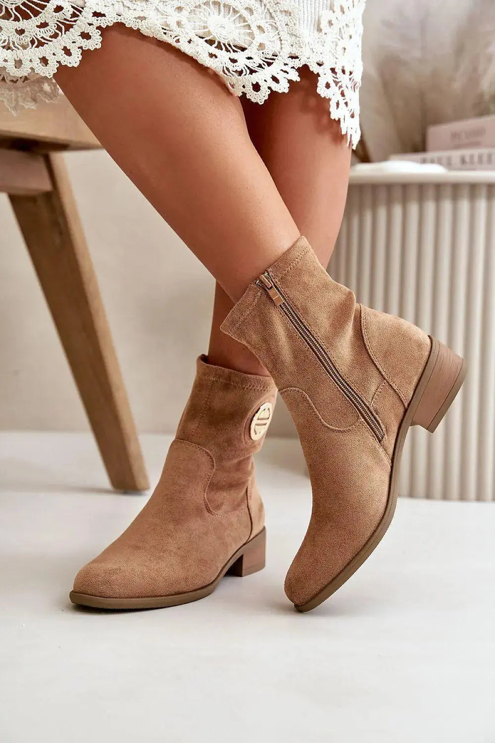 Step in style Women's ankle boots with a low heel from the Jezzi brand