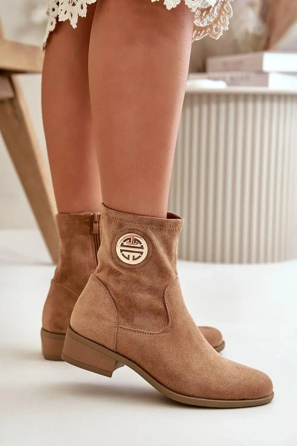 Step in style Women's ankle boots with a low heel from the Jezzi brand